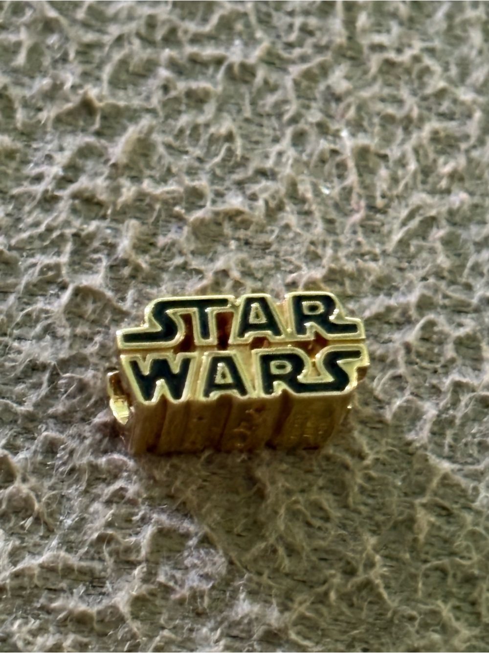 Pandora Gold and Black Star Wars Logo Charm